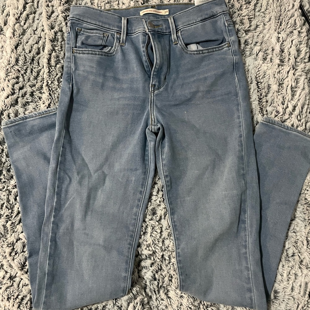 Levi high rise super skinny jeans, size 27, never worn